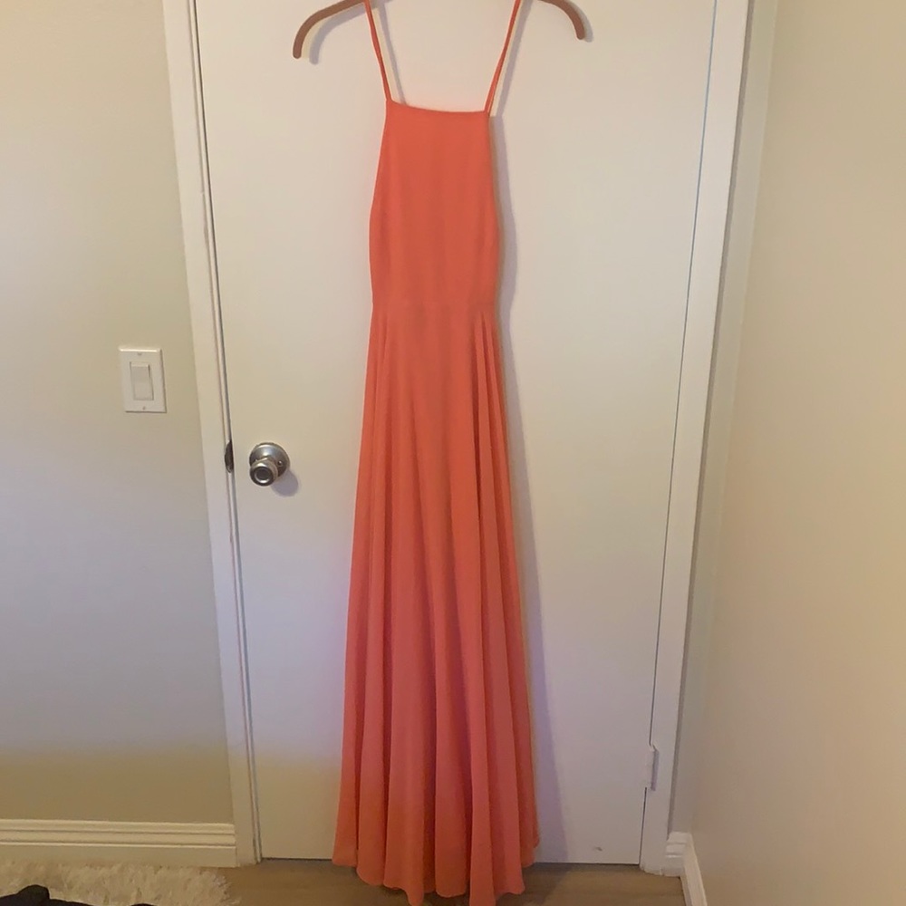Salmon colored floor length dress